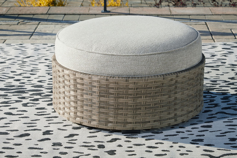 Calworth - Beige - Ottoman With Cushion.