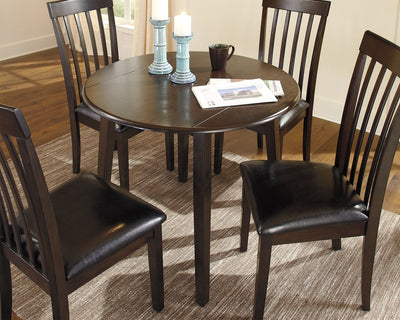 Hammis - Dark Brown - Round Drm Drop Leaf Table.