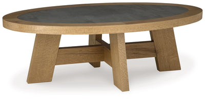 Brinstead - Light Brown - Oval Cocktail Table.