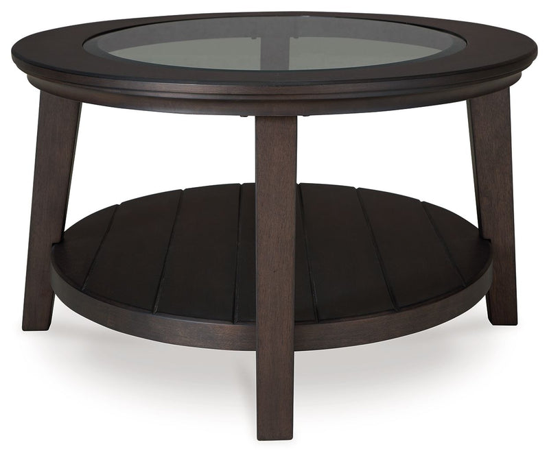 Celamar - Dark Brown - Oval Cocktail Table.