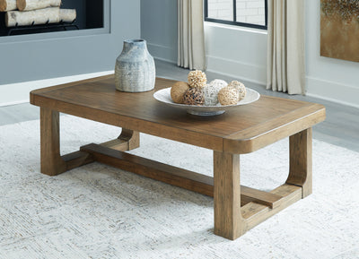 Cabalynn - Light Brown - Rectangular Cocktail Table.