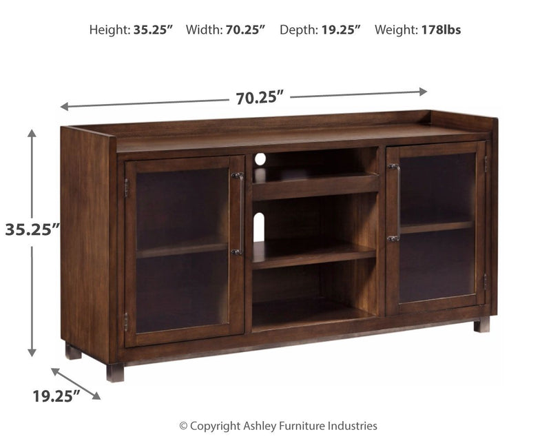 Starmore - Brown - Xl TV Stand W/Fireplace Option.