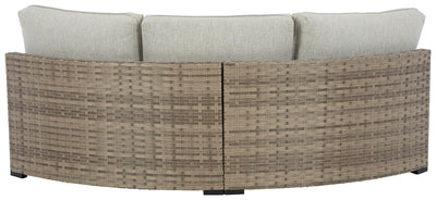 Calworth - Beige - Curved Loveseat With Cushion.