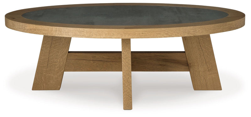 Brinstead - Light Brown - Oval Cocktail Table.