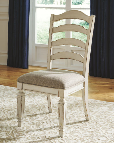 Realyn - Chipped White - Dining Uph Side Chair (Set of 2) - Ladderback - Grand Furniture GA